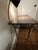 Wrought iron black shelves (4); built-in black metal lamp; matching chair total = 2 pieces