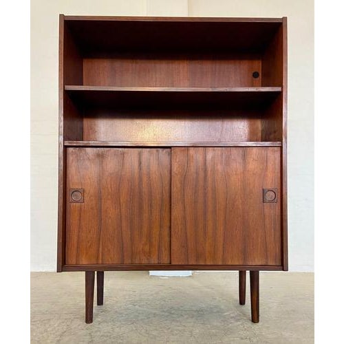 Danish Vintage Retro Rosewood Bookcase – 1960s Beautifully crafted in Denmark, circa 1960, this elegant rosewood bookcase...