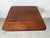 A beautiful antique English Regency Pembroke table crafted from solid mahogany, showcasing elegant proportions and...