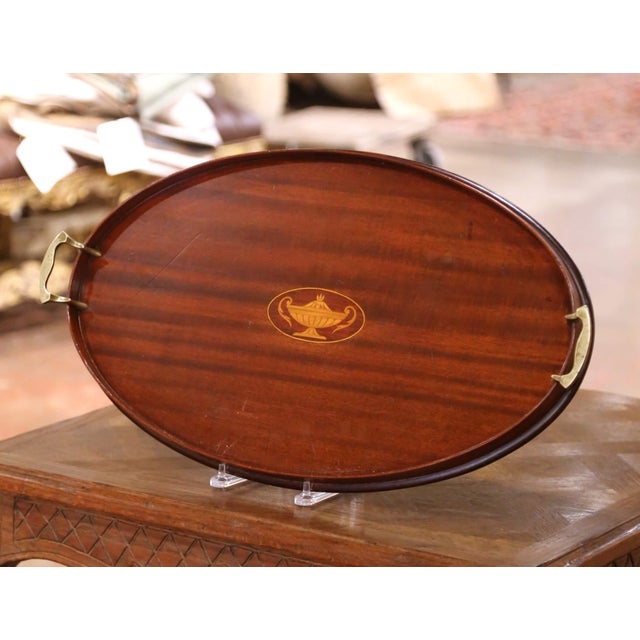 Embellish a coffee table or ottoman with this elegant mid-century English serving tray. Crafted in England circa 1960, the...