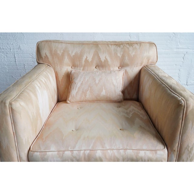 Mid Century Dunbar Club Chair. Reupholstered in satin finish shades of peach. Includes small pillow.