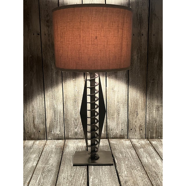 Vintage Girardi spiral Memphis-style metal lamp, signed and dated ‘97. This particular piece features a striking...