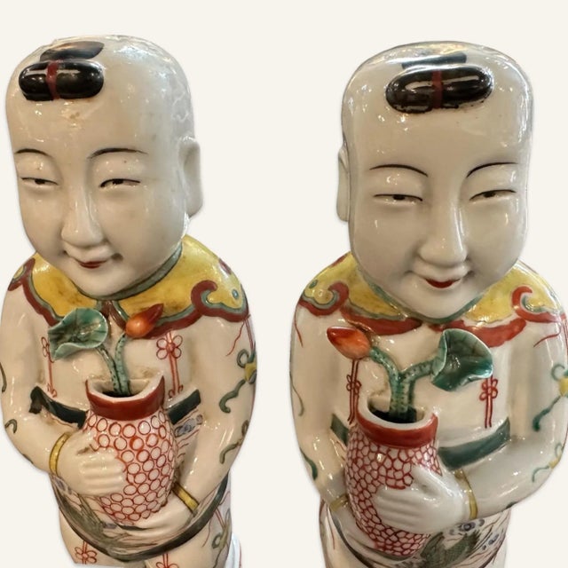 These two Chinese famille verte Kangxi Dynasty style boys were likely reproduced by the famous Edmé Samson porcelain...