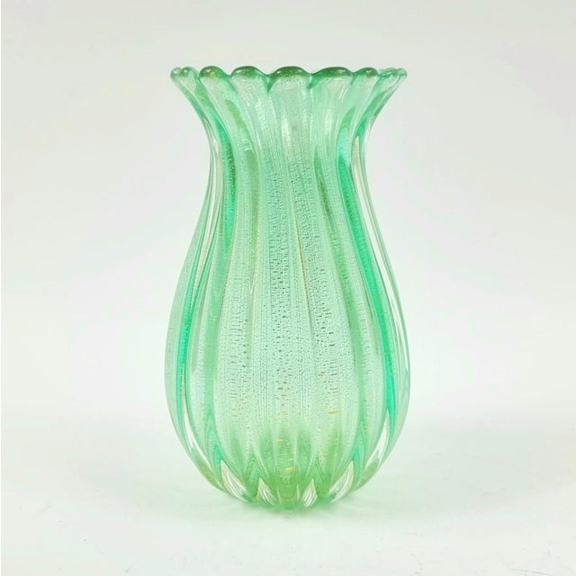 Stunning mid-century modern green & gold ribbed glass vase by the Italian master-blower Archimede Seguso and executed in...