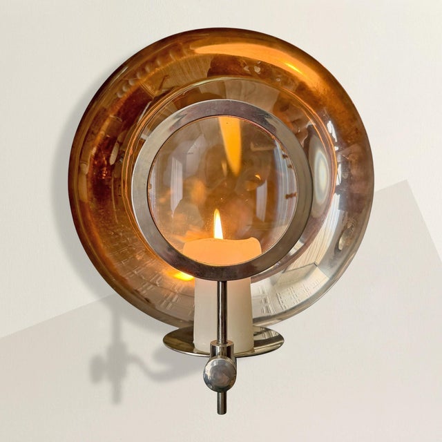 Before modern examination lamps and surgical lighting, there were objects like this: ingenious, slightly severe, and...