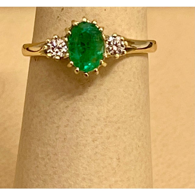Approximately 0.80 Carat Oval Cut Emerald & Diamond Ring In 18 Karat Yellow Gold Size 6.5 A Classic, ring Absolutely...
