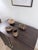 A beautifully curated, 4-piece collection of vintage mid-century hand-woven decorative baskets. Masterfully crafted using...