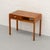 Italian Art Deco desk from circa the 1930s/40s, crafted in warm wood with richly figured burl veneer. The top and drawer...