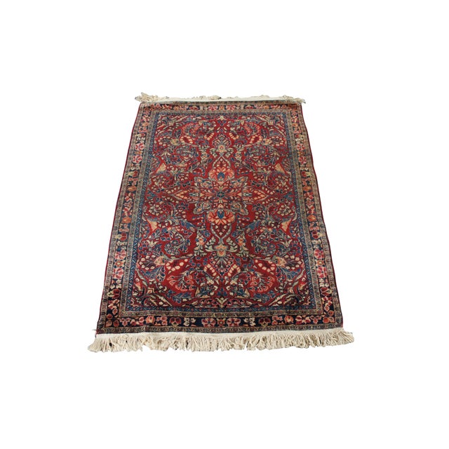 Stunning vintage hand-knotted wool area rug features a classic traditional design with exceptional craftsmanship. A...