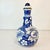 Vintage Home is pleased to offer this hand-painted Italian Decanter. The design is a floral botanical in Blue and White....
