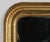 A large 19th century French Louis Philippe giltwood mirror in wonderful condition, despite age. Slight antiquing to mirror...