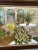 Gorgeous vintage still life Veranda oil painting in a dark wood frame signed. Vibrant beautiful colors with wicker chairs,...
