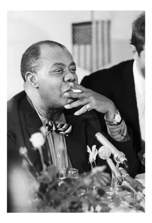 Louis Armstrong Smoking a Cigarette, Berlin, 1965