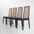 Elegant set of four '840' dining chairs designed by Tito Agnoli for Montina in the 1970s. Beech frame with black lacquer...