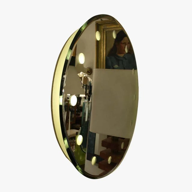 A 1960s luminous mirror. Italian Design. This piece is designed in the style of the selected designer and/or manufacturer