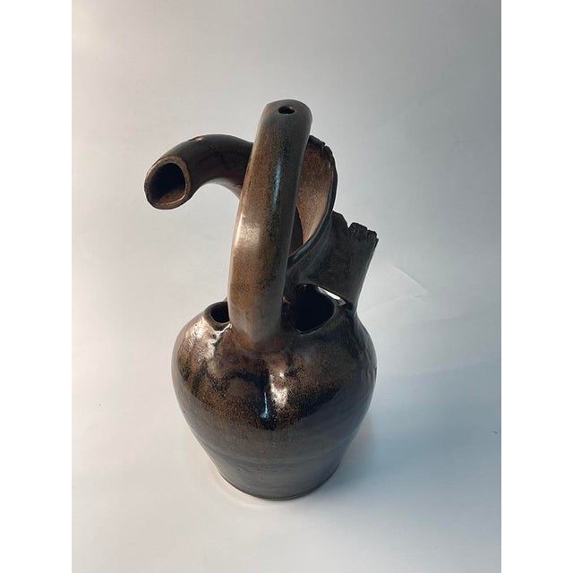 A wonderful sculptural piece, circa 1970s. Vase is signed faintly therefore hard to determine what is says and who the...