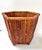 A handsome planter for a larger pot. It could also double as a wastebasket. Dimensions 11.25" tall 14.25" wide 12.25" deep