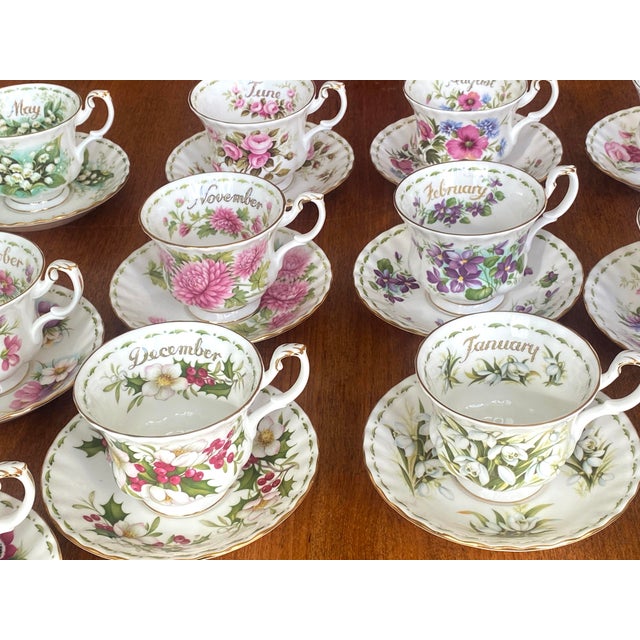 Vintage tea set comprising 12 cups and 12 saucers in fine English porcelain, manufactured by Royal Albert, Flower of the...