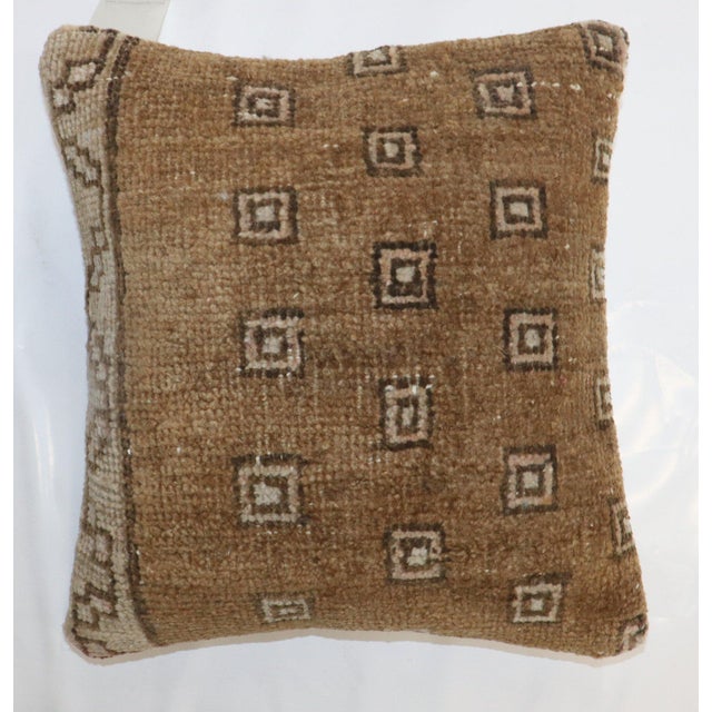 Pillow made from a vintage brown Turkish Kars rug Measures: 16'' x 17''