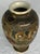 Antique early-20th-century Japanese Satsuma export vase featuring hand-painted depictions of Buddhist arhats or sages.It...