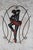 Rare pair of Mid Century Modern circa 1958 black ballerina dancers hanging on decorative grates. Almost never offered...