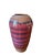 A substantial hand-thrown studio pottery vase featuring horizontal bands of deep red and plum glaze with subtle tonal...