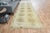 This vintage hand-knotted area rug is a semi-antique vintage area rug. The '70s Eastern region of Anatolian's unique rug...