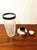 The elegance of a Hollywood Regency bar, a blend of silvery brilliance and satiny transparency. This shaker combines a...