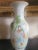 Gorgeous, large, Asian glazed ceramic vase with a kite flying scene, and a beautiful geisha in the center of the vase. The...