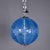 This spherical pendant light is composed of shaped and cut blue Murano glass panels arranged in a diamond lattice, secured...