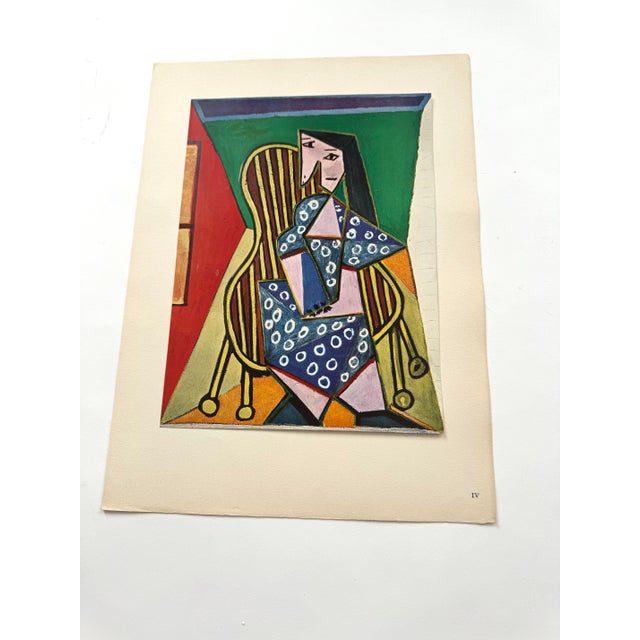 Here is an original limited edition Pablo Picasso print "Femme Assise” or “Femme Assise Dans Un Fauteuil (Seated Woman in...