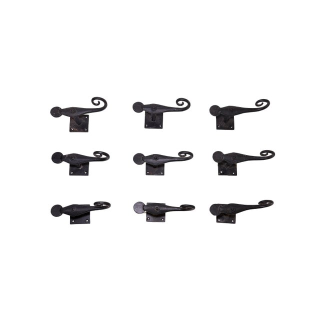 Vintage, Spanish Santa Barbara style, hand-forged, black cast-iron shutter stops, latches, or Shutter Dogs, Set of 9. The...