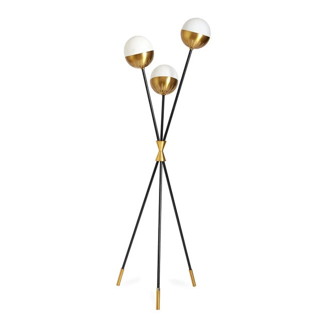 Kinetic Modernism. Divinely dynamic, the Caracas Tripod Floor Lamp is light and airy, but with a strong presence....