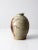 This is a vintage studio pottery vase. Signed by the artist, the hand-crafted beehive vase features a speckled glaze with...