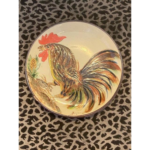 Vintage Portuguese Low Relief Pottery Rooster Plates 1) Large plate 7.75” Diam Each one signed Puigdemont. 2) smaller plates