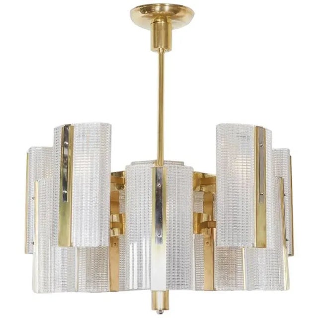 Very large Art Moderne highly architectural ten-arm chandelier comprising bi level rectangular boxes of interlacing lines...