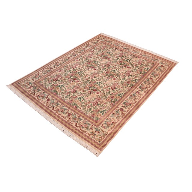 Designed with mesmerizing intricacy and gorgeous color palette, this hand-knotted masterpiece demonstrates the beauty and...
