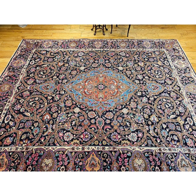 A masterful work of textile art, this vintage Persian Khorassan rug dates to the second quarter of the 20th century and...