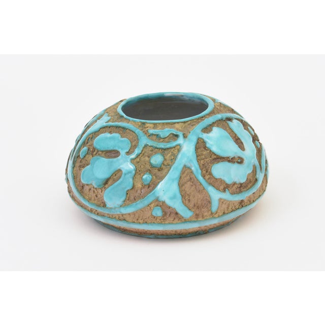 Offering for you is a lovely mid century modern Italian ceramic eathenware bowl with sgraffito raised relief abstract...