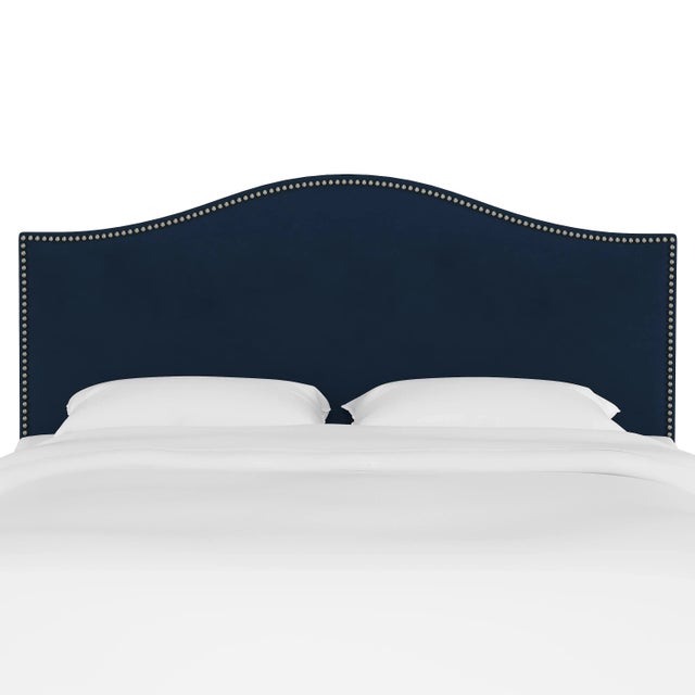 Give your interior a lift with the Headboard. Featuring the delicate curves of a classic camelback design, with subtle...
