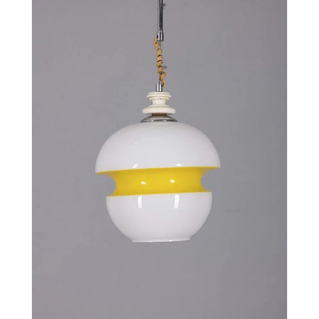 Chandelier with white opal glass lampshade with a yellow central stripe, Italian design, 1970s. Up to 250V (Europe/UK...
