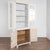 This narrow Swedish display cabinet may also be used as a bookcase. Fluted panel doors and decorative carving along the...