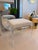 The Gerrard Accent Stool features sleek, polished acrylic frames paired with soft boucle cushions, creating an airy...