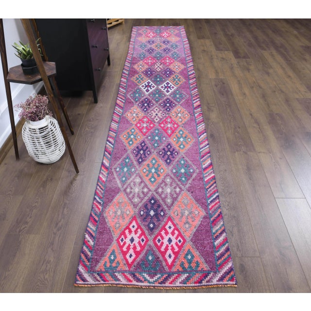 Vintage Turkish Hand-Knotted Runner Rug is a semi-Vintage runner rug. '70s Eastern region of Turkey's unique rug is...