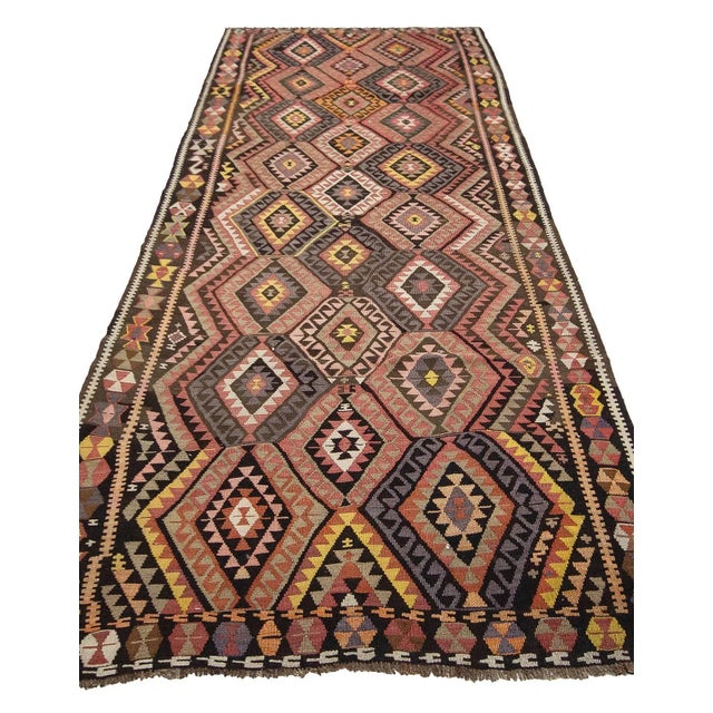 Handwoven vintage kilim rug from Kars region of Turkey. Approximately 50-60 years old. In very good condition.