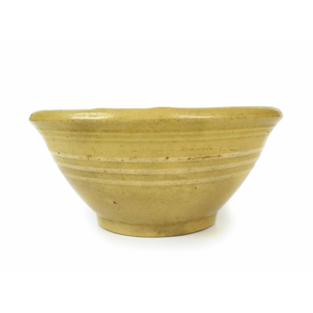 Stunning rare early 20th century yellow stoneware bowl. It is a perfect addition to any kitchen decor or to your stoneware...
