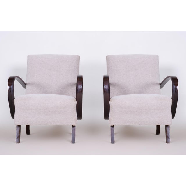 Chair model c - also known as "canadian" this pair of armchairs is a true icon of interwar interior design and one of the...