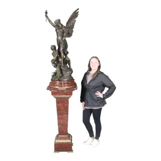 Rouge Marble Pedestal With Bronze E. Piccault Statue For Sale