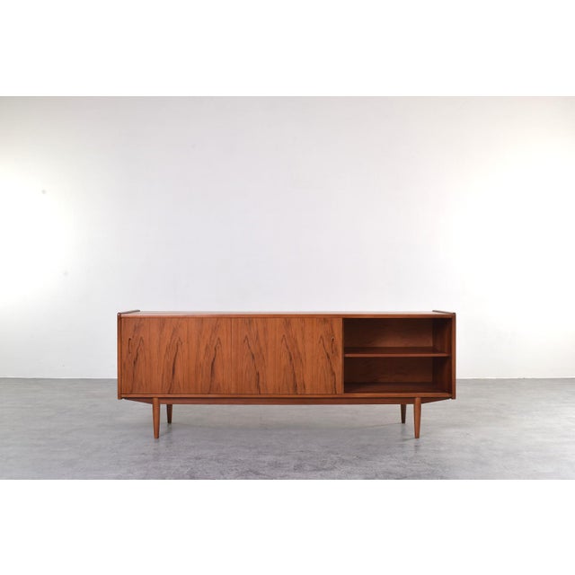 A sideboard from the Trio model, designed by Nils Jonsson and produced in the 1960s by the Swedish company Hugo Troeds of...