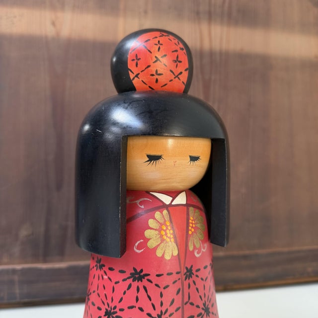 Rare vintage sōsaku kokeshi by Kazuo Takamizawa, a highly regarded Japanese kokeshi artist. The wooden doll has an...